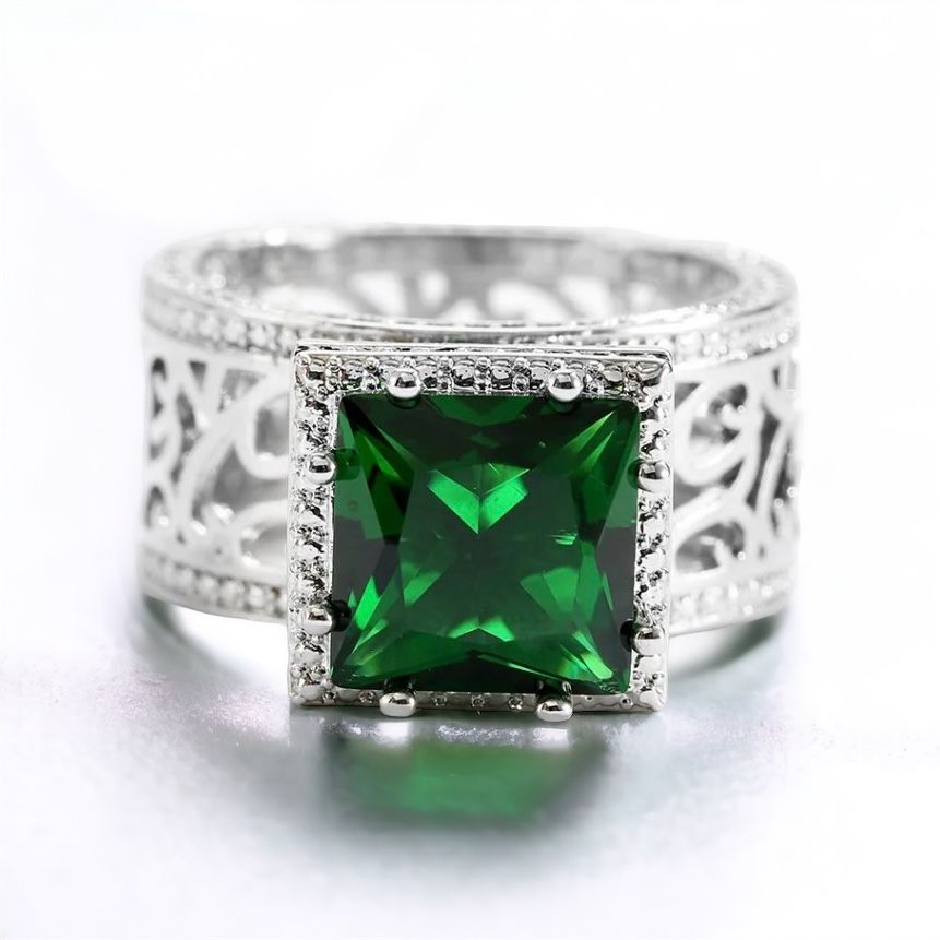 The Emerald Enigma Ring